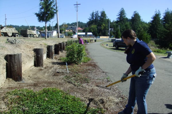 Coquille students help maintain the Coquille River walkway.